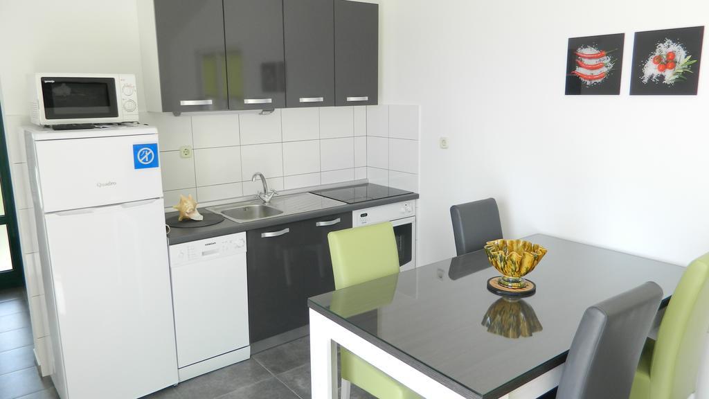 Apartmani Marinovic พอดโกรา ภายนอก รูปภาพ
