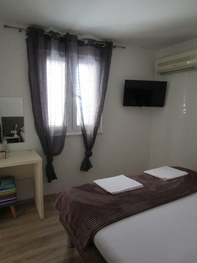 Apartmani Marinovic พอดโกรา ภายนอก รูปภาพ